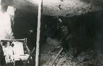 Бригада Андрея Ивановича Подосенова за работой в шахте