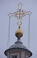 Крест, венчающий колокольню собора