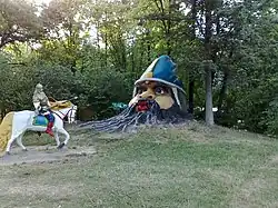 Поляна сказок.  Детский парк в Симферополе. Руслан - скульптор Л. С. Смерчитский, Голова брата Черномора - скульптор В. И. Солощенко.