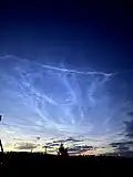Мезосферные (серебристые) облака в небе над Якутией, июль 2021 года
