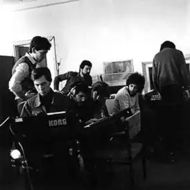 ВИА «Редкая птица» на записи в студии 1983 г.
Стоит слева - Сергей Галанин (бас гитара). Сидит - Алексей Аедоницкий. Сидит в наушниках - Евгений Хавтан (гитара), справа от него - Олег Сальхов (звукорежиссёр).