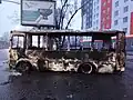 Служебный полицейский автобус ПАЗ-3205, сожжённый протестующими