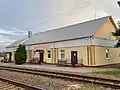 Здание железнодорожной станции Воложин в агрогородке Городьки (2021 год)