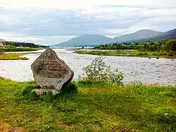 Река Колвица и памятный камень