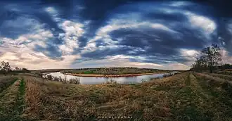 Вид на село Полонистое с противоположного берега реки Ятрань