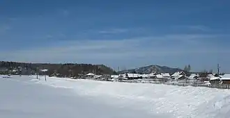 Вид на северную часть посёлка с мостачерез р. Малый Кебеж