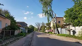 вид со стороны перекрёстка улиц Алексеева и Партизанской