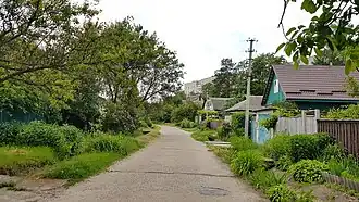 средняя часть улицы,справа дома №№ 25, 27, 27Б