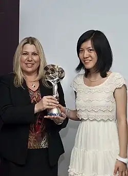 Передача почётного кубка «Каисса», как лучшей шахматистке 2010, 2011, 2013, 2014 годов