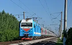 Электровоз ЭП1М с пассажирским поездом следует по перегону Мышастовка — Ведмидовка