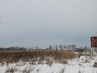 Полигон (на дальнем плане) в январе 2018 года