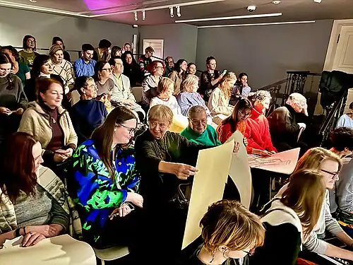 Зрители на лекции ...