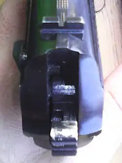 ПМ (снят с предохранителя, курок взведён): вид сзади