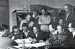 Ю. Д. Прокошкин (сидит в центре) с сотрудниками своей лаборатории в ИФВЭ