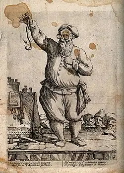 Стоя на сцене, держа в руке змею, странствующий фармацевт призывает покупать его снадобьяГравюра Дж.М. Мителли