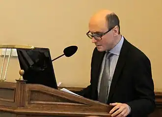 А. В. Рыков во время выступления на международной конференции "Актуальные проблемы теории и истории искусства", 2014