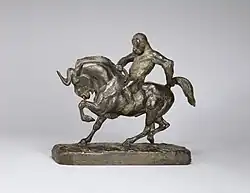 Обезьяна верхом на антилопе гну