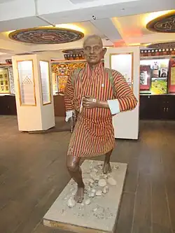 Бутанский почтовый гонец в экспозицииБутанского почтового музея в Тхимпху