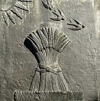 Сноп с ласточками под солнцем