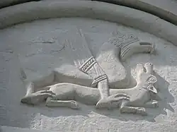 «Терзающие хищники». Рельеф закомары Храма Покрова на Нерли. Боголюбово. Середина XII в. Камень