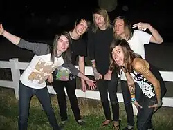 Фото участников группы Confide в 2010.