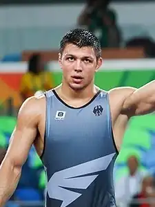 После победного поединка на Олимпиаде 2016 (слева)