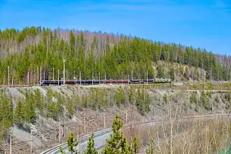 Доставка руды на переработку по гребню плотины