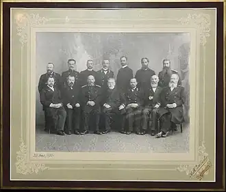 Служащие енисейского губернского правления с губернатором М.А. Плецем.
Сидят слева направо: Теплов Александр Степанович, статский советник, тюремный инспектор, 4-й - М.А. Плец