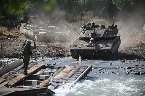 Пума с катковым минным тралом.