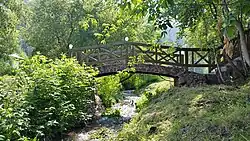 Пешеходный мост над р. Малая Слизнева около ресторана «Маяк»