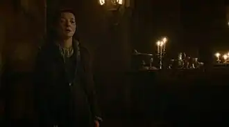 Кейтилин Старк после безуспешной мольбы пощадить жизнь её сына Робба, за пару секунд до своей смерти. Игра Мишель Фэйрли была высоко оценена критиками, а саму сцену многие посчитали травматической.