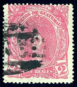 2 реала (Sc #12), погашенная овальным номерным почтовым штемпелем «6» (в Кесальтенанго)