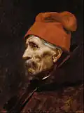 Old man wearing a red fez