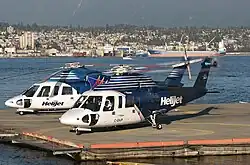 Два вертолёта Sikorsky S-76 авиакомпании Helijet в Ванкувер Харбор