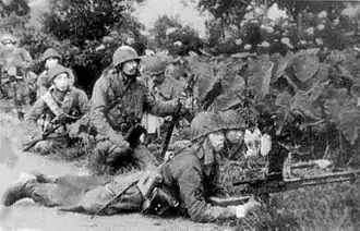 Японские парашютисты атакуют голландские войска на аэродроме Лангоан, январь 1942 года