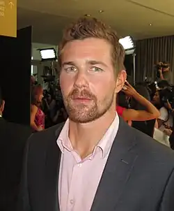 Келли в 2014 году.