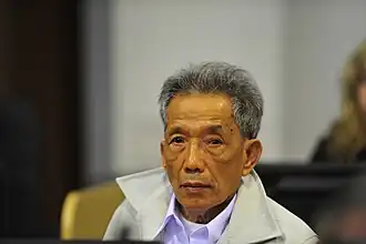 Канг Кек Иеу в ЧПСК во время судебного процесса в 2011 году