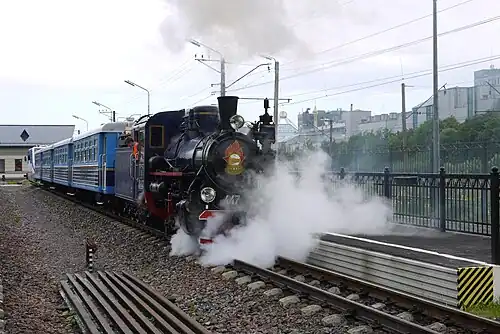 Паровоз Кп4 c поездом на станции