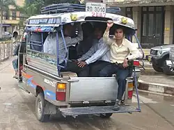 Маршрутное такси (грузовой мотороллер) в Лаосе