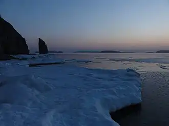 Западное побережье зимним вечером