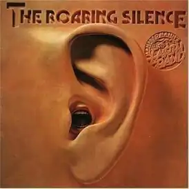 Обложка альбома Manfred Mann’s Earth Band «The Roaring Silence» (1976)