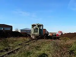 ТУ4-2314 с поездом на эстакаде