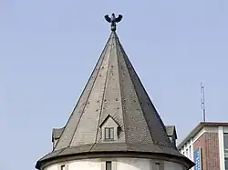 Дортмундский городской герб - орел - на шпиле башни
