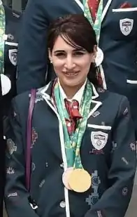 Нигяр Насирова с медалями IV Игр исламской солидарности в 2017 году