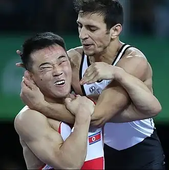 Юн Вон Чхоль (слева) против Хайсама Махмуда, Рио 2016