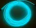 Бухта с включенным электролюминесцентным проводом голубого свечения