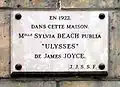 Мемориальная доска на доме № 12 по рю де л'Одеон (Париж)