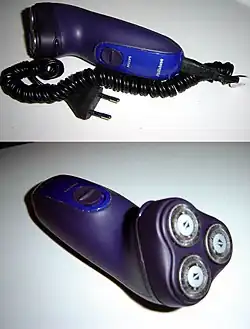 Роторная электробритва с тремя бреющими головками