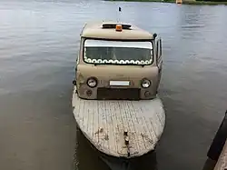 Буксир парома через реку Полдневную