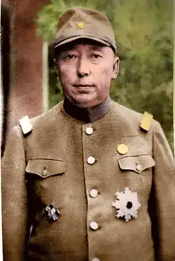 Дэ Ван Дэмчигдонров, в японской военной форме